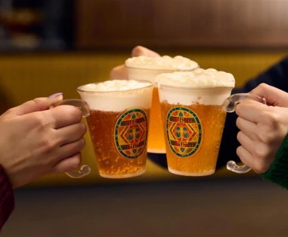 People enjoying Butterbeer at the Warner Bros. studio in London 