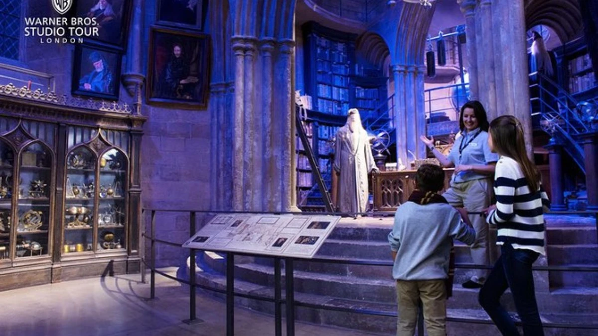 A mother and son experiencing the Warner Bros studio with an expert guide.